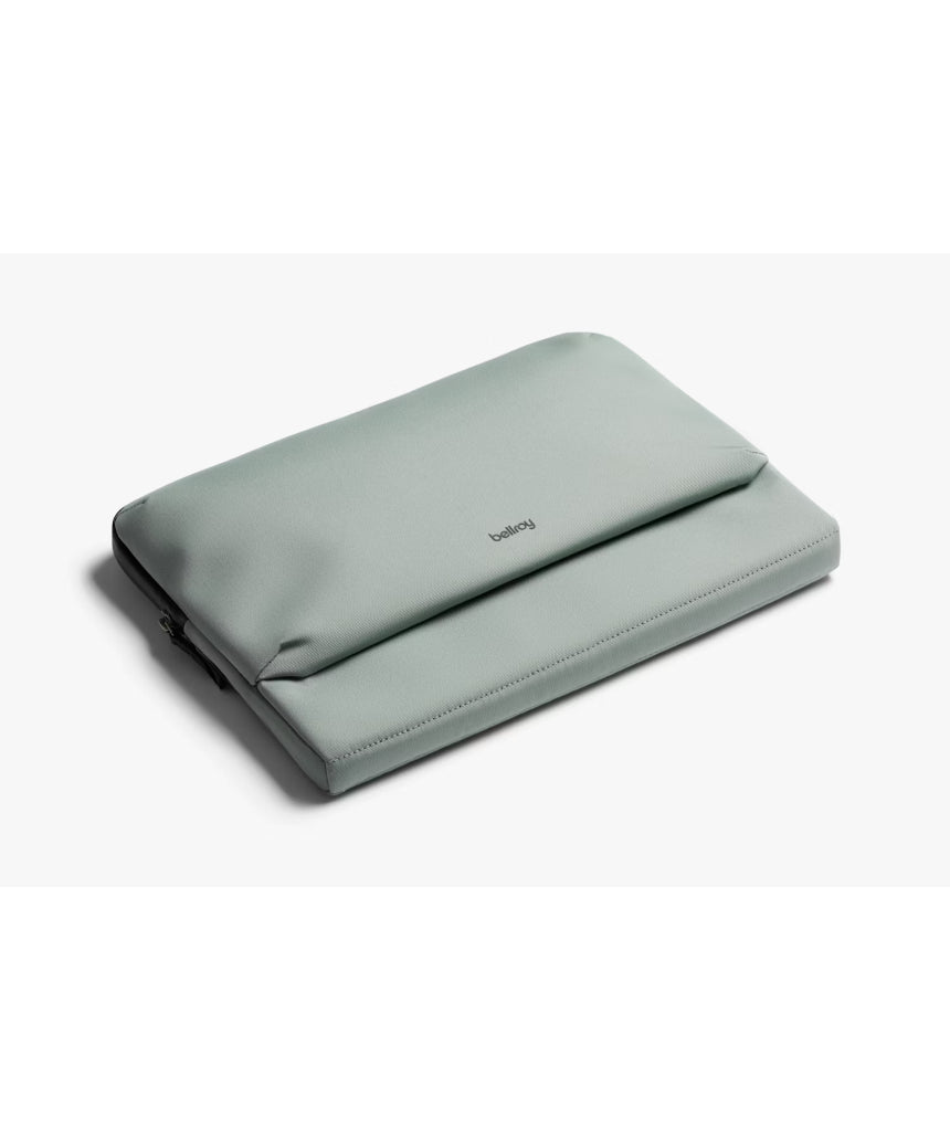 Bellroy 14-inch Laptop Caddy in Eucalyptus with organized compartments and padded handle for easy carrying.