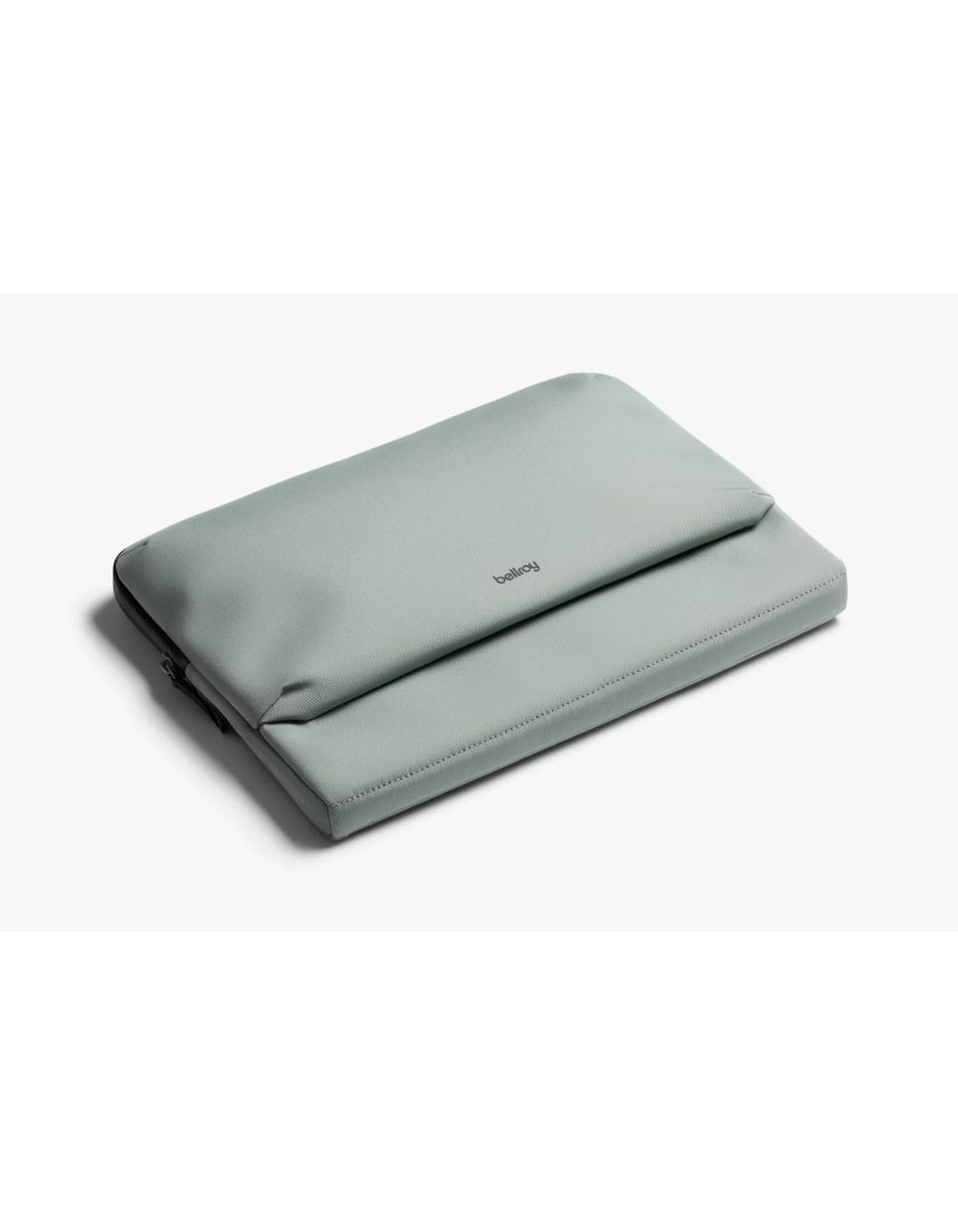 Bellroy 14-inch Laptop Caddy in Eucalyptus with organized compartments and padded handle for easy carrying.