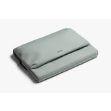 Bellroy 14-inch Laptop Caddy in Eucalyptus with organized compartments and padded handle for easy carrying.
