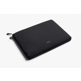Black Bellroy Lite Laptop Sleeve for 16-inch laptops, slim protective case with smooth exterior and minimalist design.