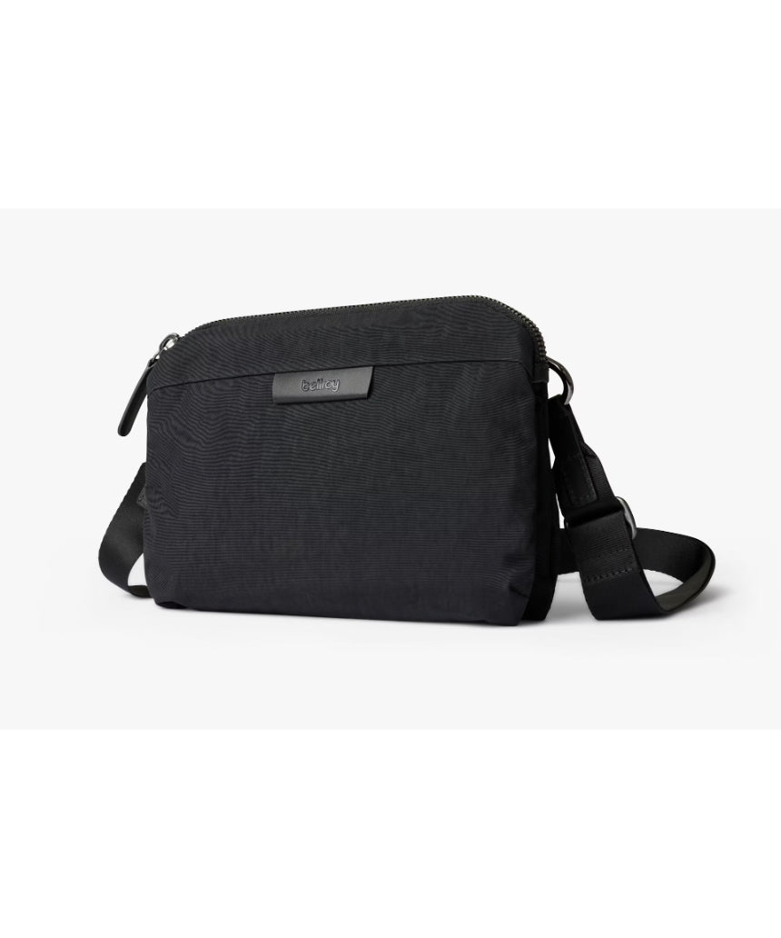 Bellroy Tokyo Side Bag in Raven, a sleek black crossbody bag with adjustable strap and minimalist design, suitable for daily use.
