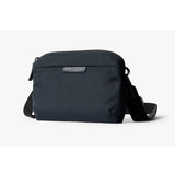 Bellroy Tokyo Side Bag in navy, a sleek crossbody bag with multiple compartments and adjustable strap, designed for everyday use.