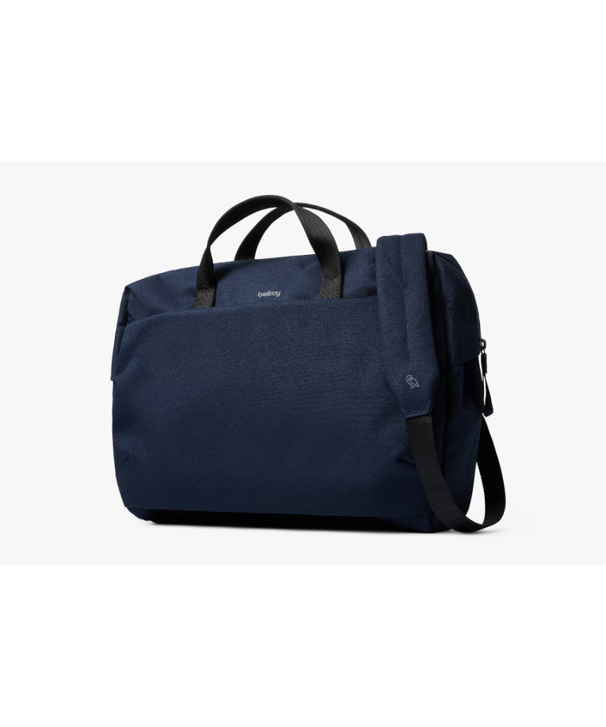 Bellroy Via Work Bag in navy color showing sleek leather design with multiple compartments and adjustable shoulder strap.