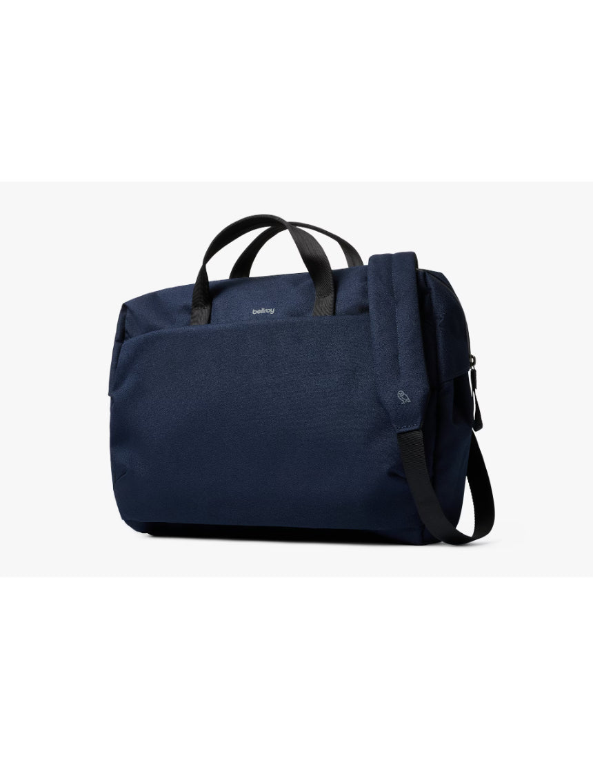 Bellroy Via Work Bag in navy color showing sleek leather design with multiple compartments and adjustable shoulder strap.