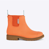 Orange Merry People Bobbi gumboots with Sherbet hue, shown from the side, durable waterproof footwear for rainy weather.