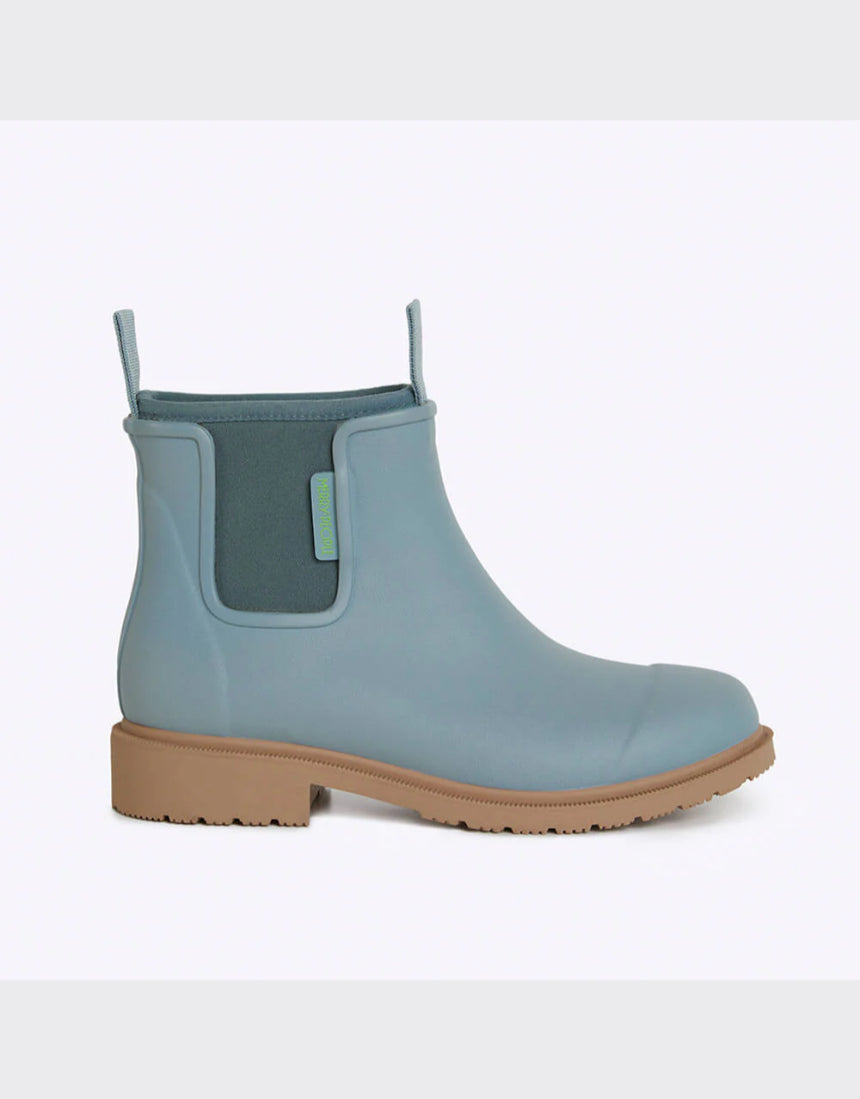 Seafoam Merry People Bobbi gumboots shown from the side, featuring waterproof rubber design and stylish, vibrant color.