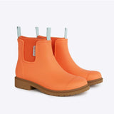 Merry People Bobbi gumboots in Sherbet Orange with a shiny rubber finish, shown from an angled view.