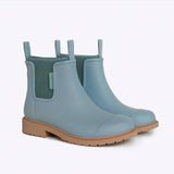Seafoam Merry People Bobbi gumboots with black soles, stylish waterproof rubber footwear for rainy days.