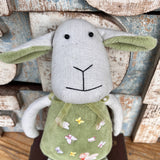 Amaranta Designs Daisy Lamb plush toy with soft fabric and detailed embroidery, ideal for children and collectors.