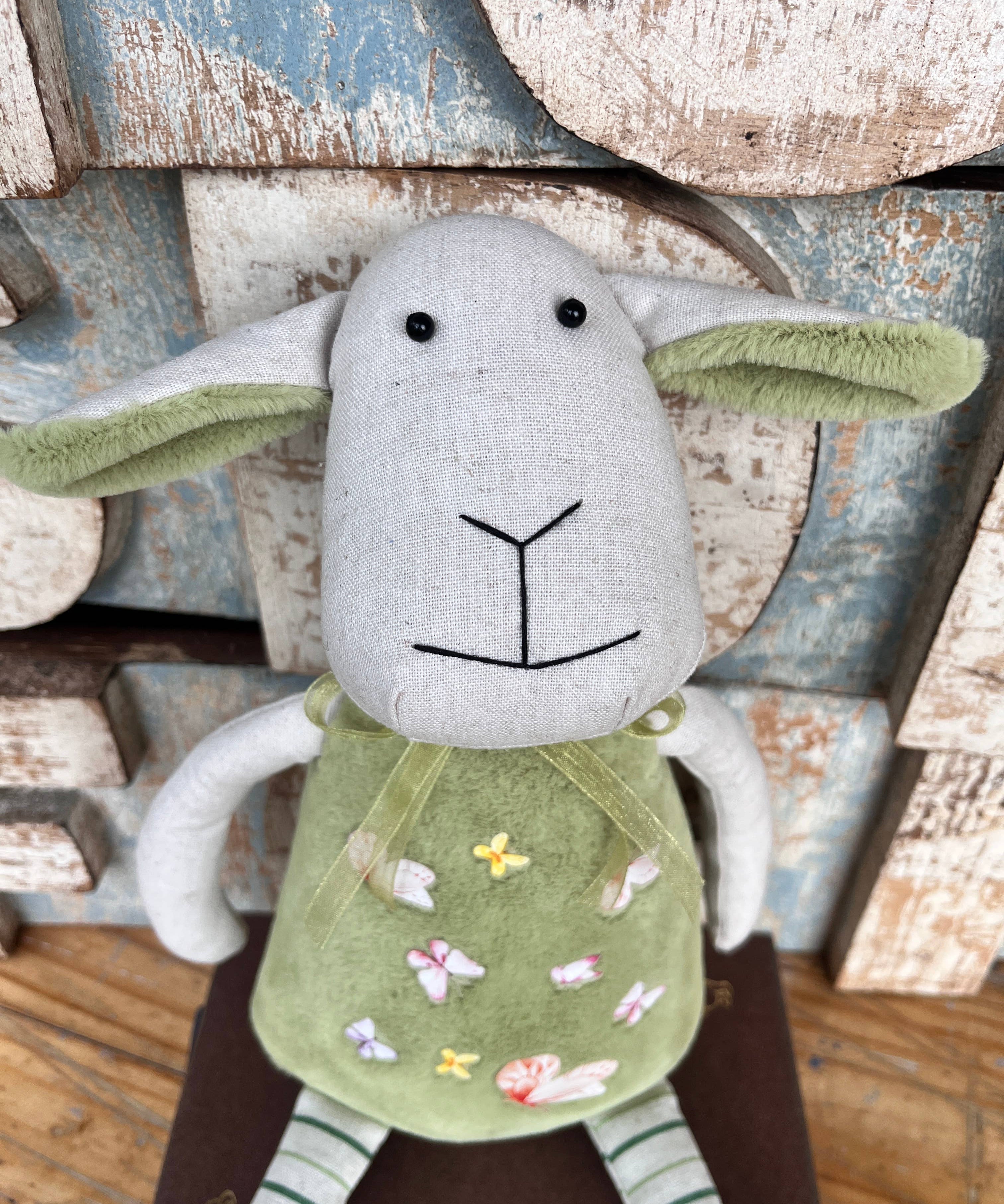 Amaranta Designs Daisy Lamb plush toy with soft fabric and detailed embroidery, ideal for children and collectors.