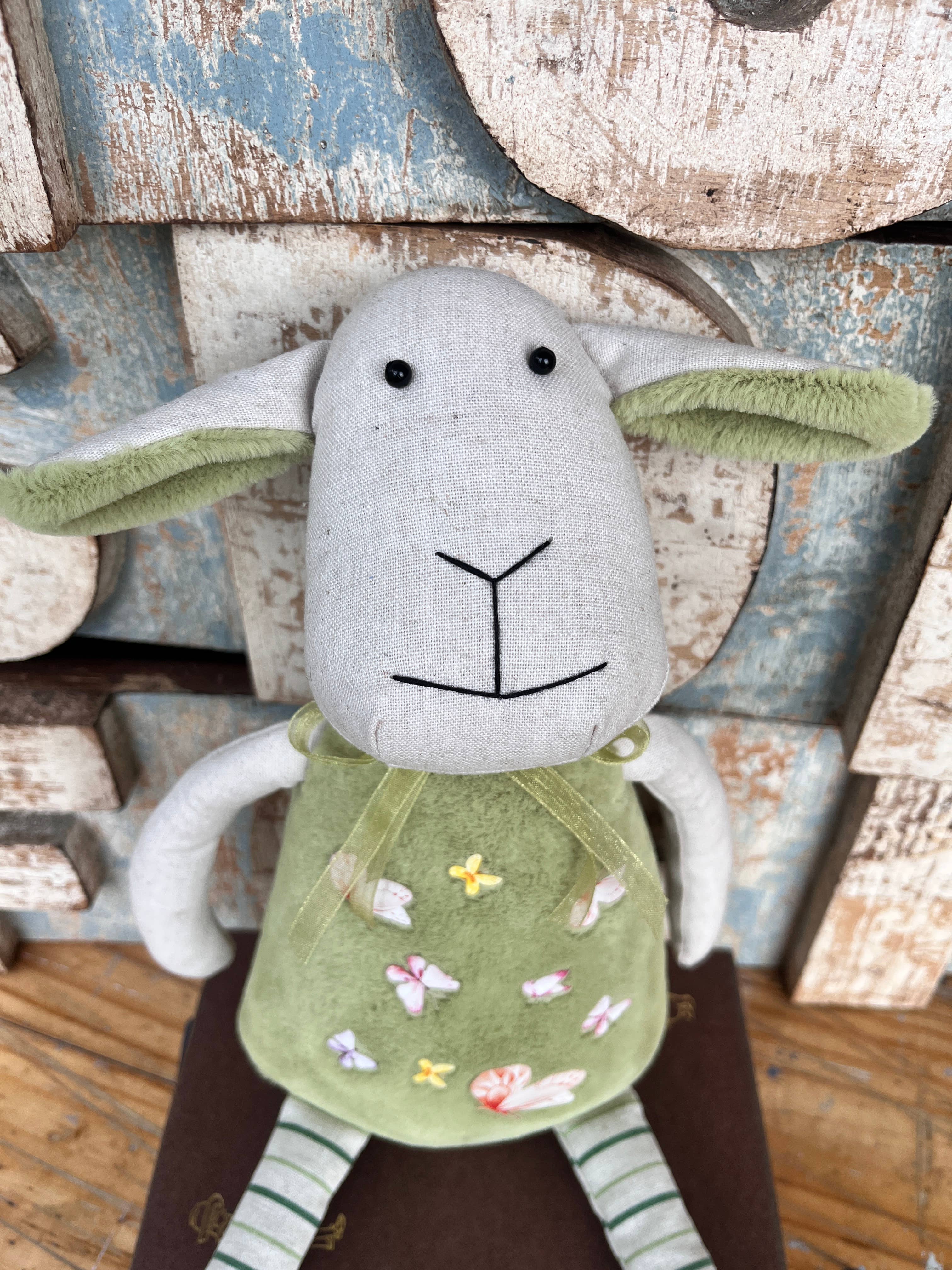Amaranta Designs Daisy Lamb plush toy with soft fabric and detailed embroidery, ideal for children and collectors.