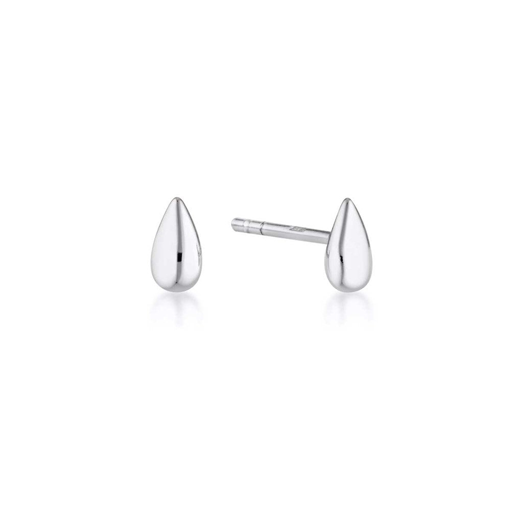 Linda Tahija Petal Stud Earrings, silver-tone jewelry with delicate petal design, close-up of the elegant stud earrings.