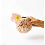 Jones & Co Pollen Vase in pink with eye design, featuring a sleek, modern ceramic vase perfect for floral arrangements.