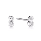 Linda Tahija duo stud earrings with sparkling white topaz gemstones on sterling silver posts, elegant and minimalist jewelry.