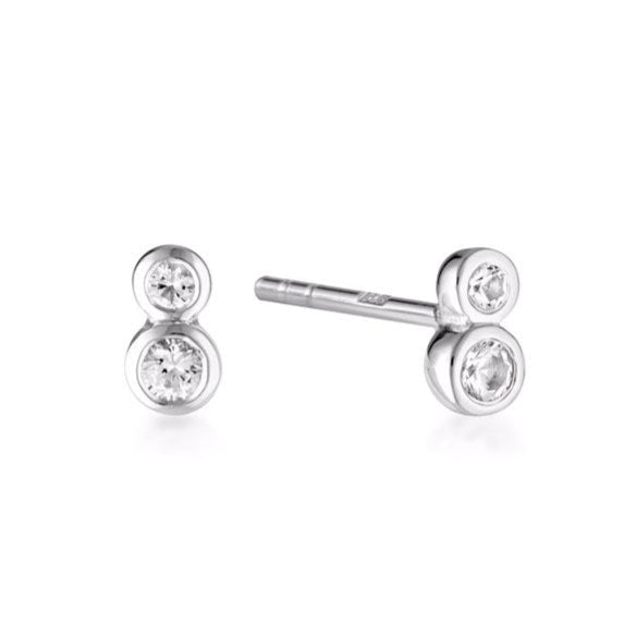 Linda Tahija duo stud earrings with sparkling white topaz gemstones on sterling silver posts, elegant and minimalist jewelry.