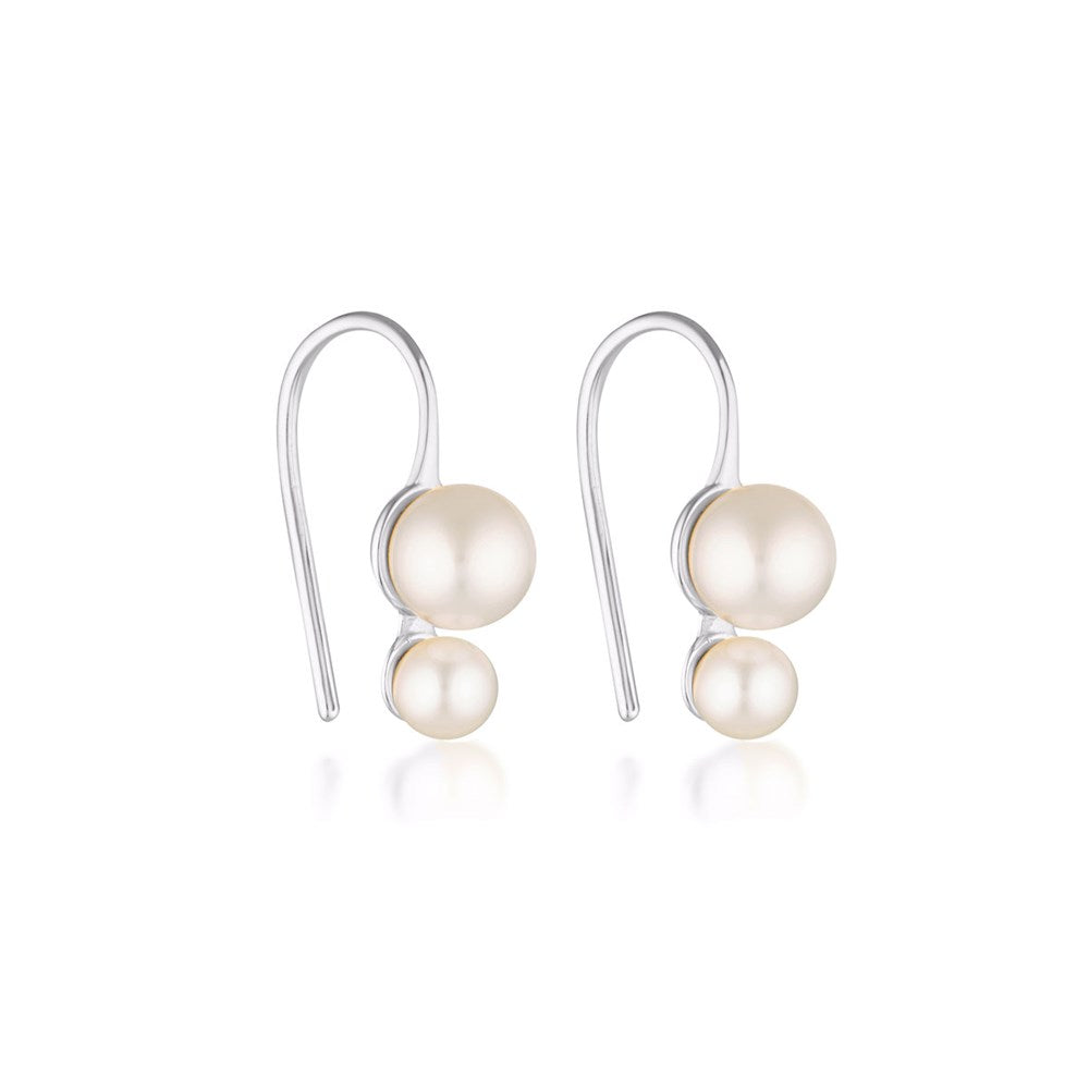 Linda Tahija double pearl drop earrings featuring elegant hooks and two white pearls on shiny silver hooks.
