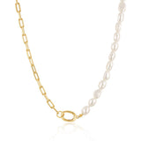 Linda Tahija paperclip necklace with Baroque pearl accents, featuring a modern design and elegant metallic chain.