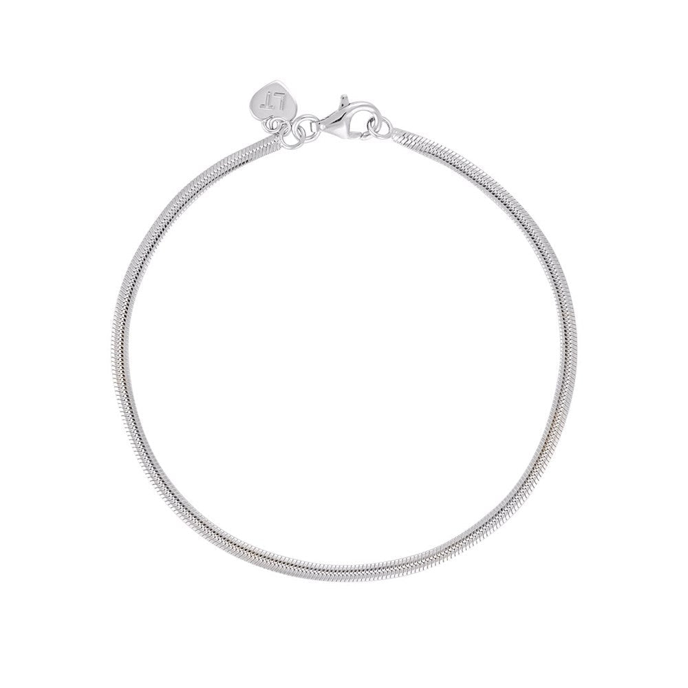 Linda Tahija fluid snake chain bracelet featuring a sleek, shiny silver design with a smooth, flexible texture.