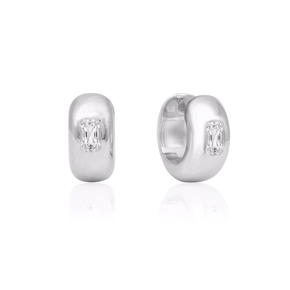 Linda Tahija Rocco Huggie Earrings with lab-grown sapphire stones, showcasing elegant hoop-style jewelry with sparkling blue sapphires.