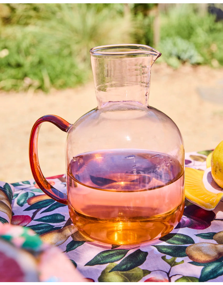 Kip & Co marshmallow and marmalade glass carafe with matching glass, featuring colorful, playful patterns on clear glass.