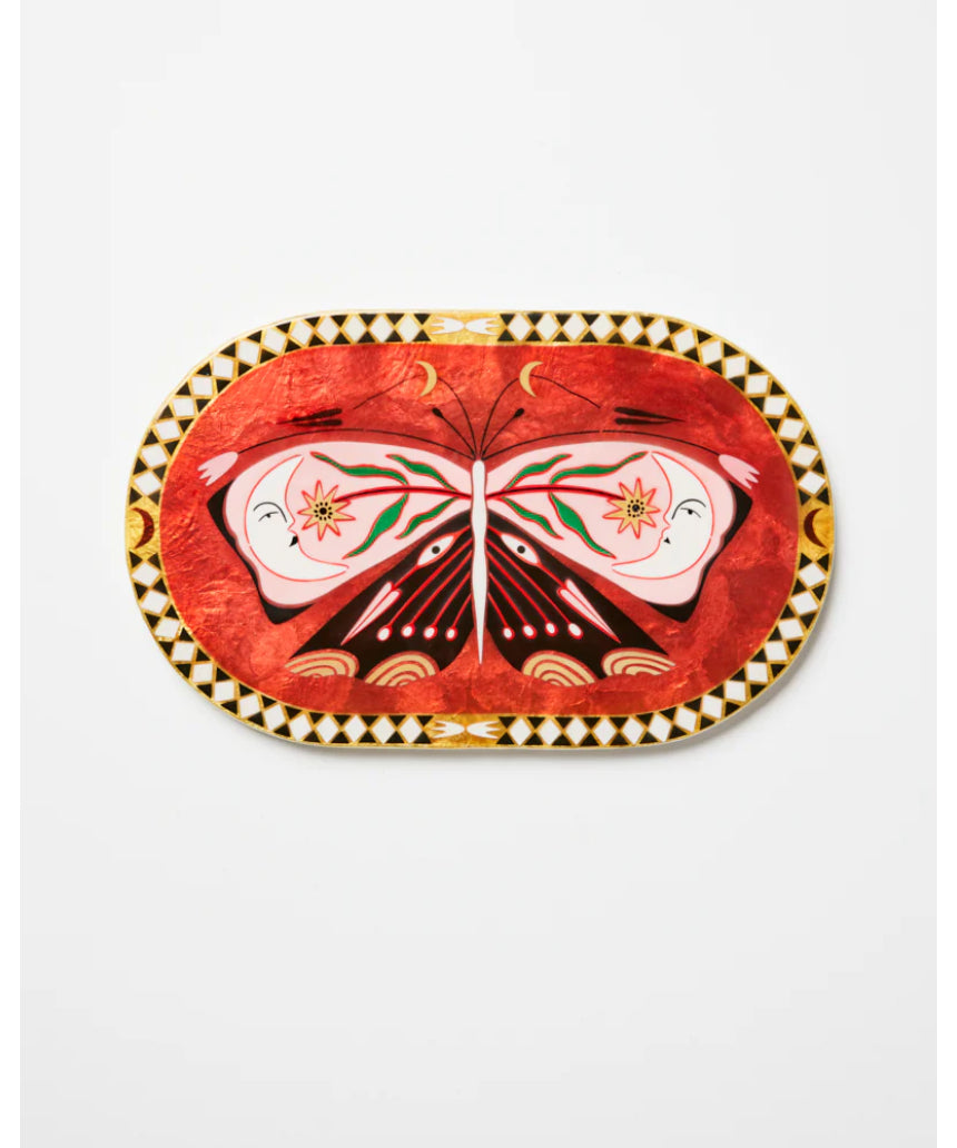 Pink oval wall decor featuring a butterfly design by Jones & Co, ideal for enhancing interior spaces with elegant art.