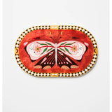Pink oval wall decor featuring a butterfly design by Jones & Co, ideal for enhancing interior spaces with elegant art.