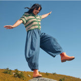 Merry People Bobbi Gumboots in Sherbet Orange, casual outdoor footwear with waterproof rubber construction and vibrant color.