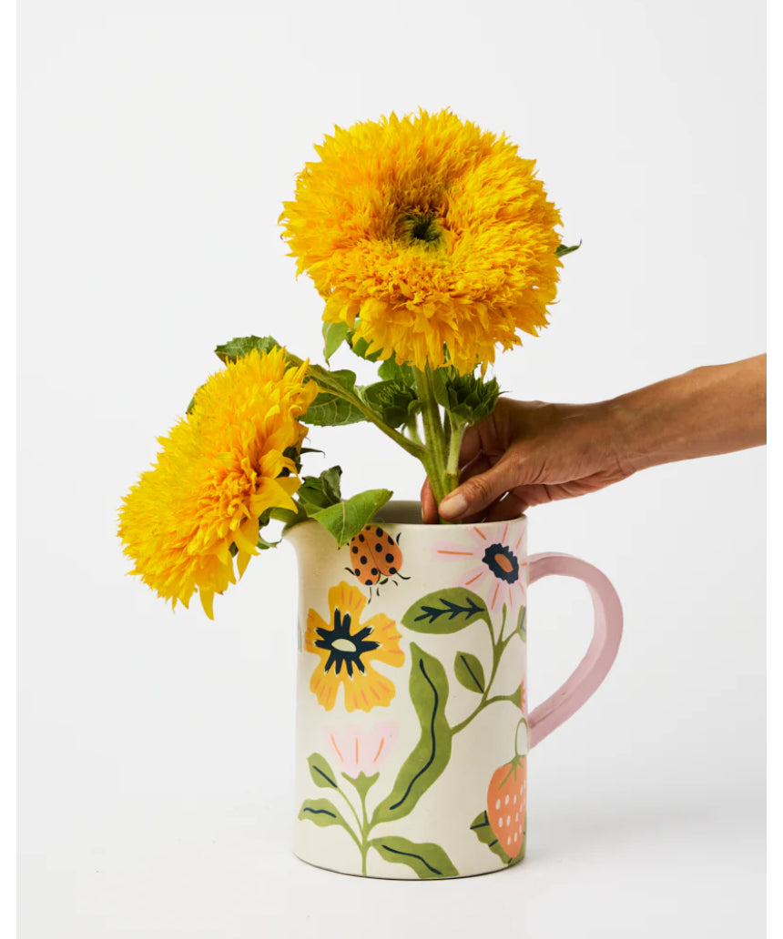 Jones & Co Meadow Jug in white ceramic, featuring a smooth, rounded design and elegant handle for serving or decorative display.