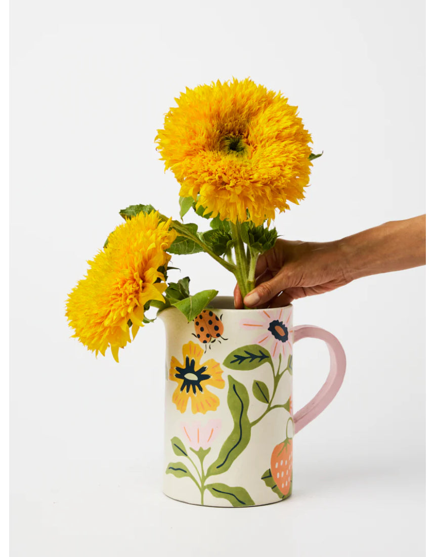 Jones & Co Meadow Jug in white ceramic, featuring a smooth, rounded design and elegant handle for serving or decorative display.