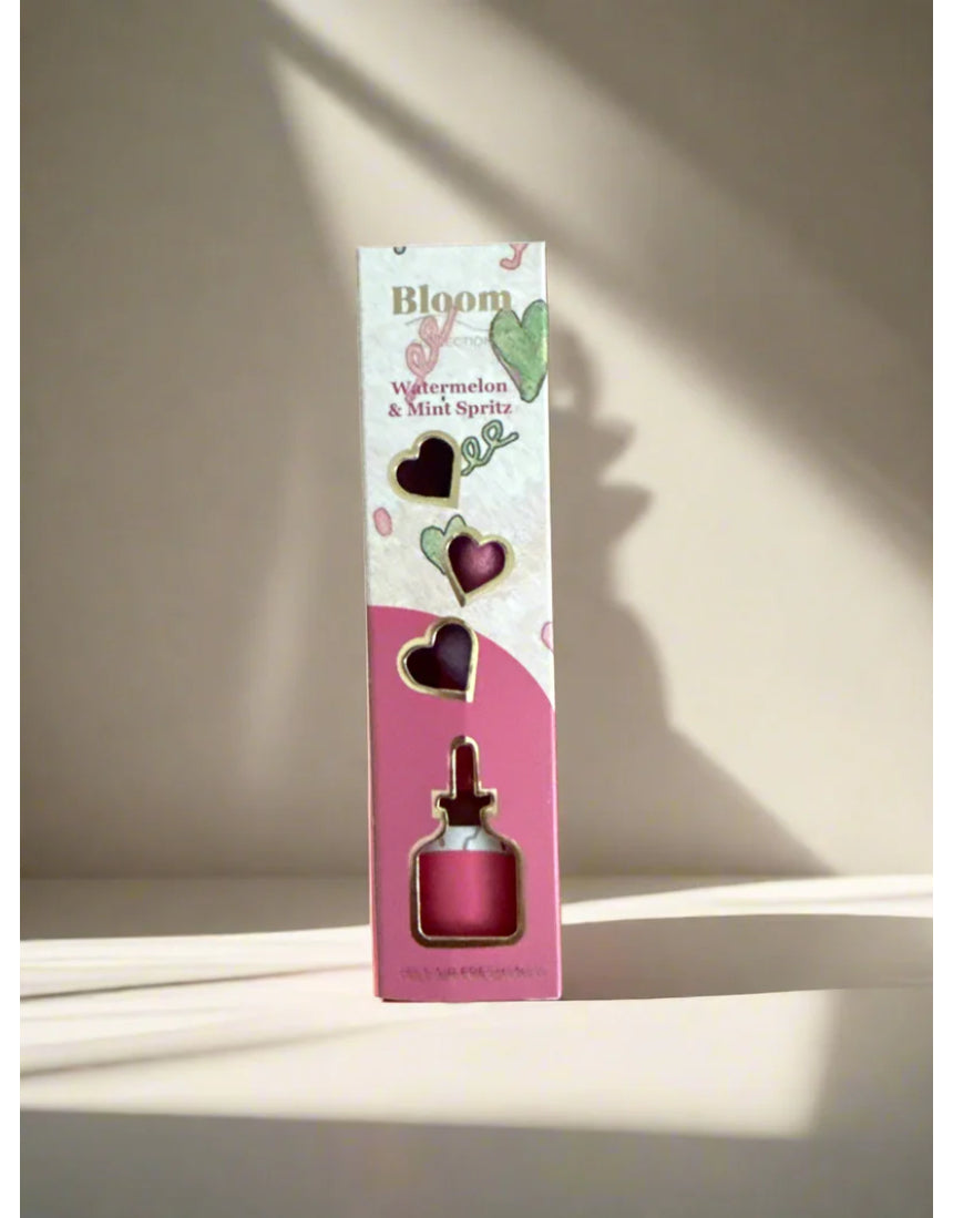 Grace & James Watermelon & Mint Heart Felt Air Freshener hanging with a pink heart shape and fresh mint and watermelon scent design