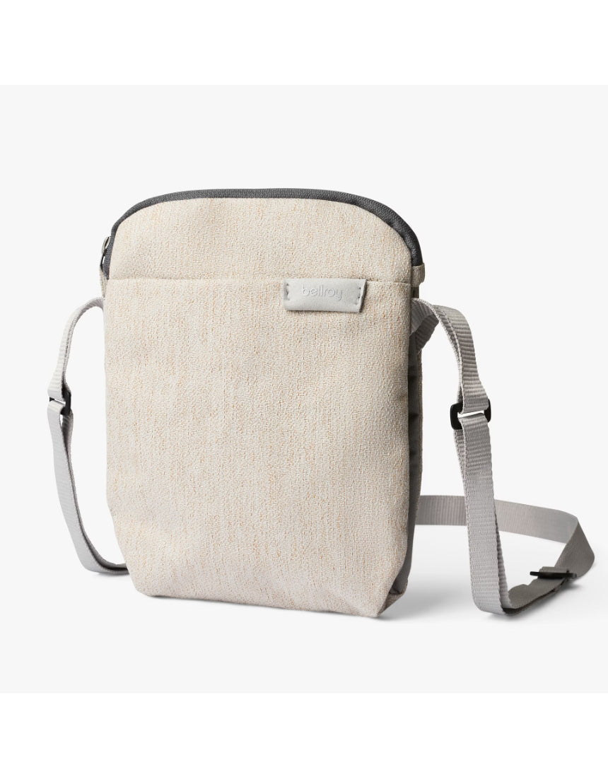 Bellroy City Pouch in Saltbush fabric, showing its compact bag design with zipper closure and multiple compartments.