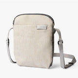 Bellroy City Pouch in Saltbush fabric, showing its compact bag design with zipper closure and multiple compartments.