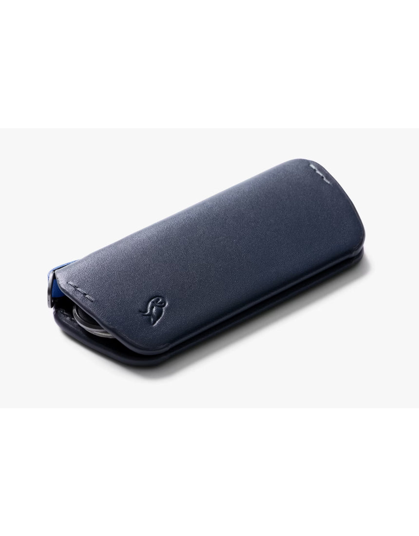 Bellroy Key Cover Plus 3rd Edition in navy, showing a sleek leather key organizer with multiple key slots and a modern design.