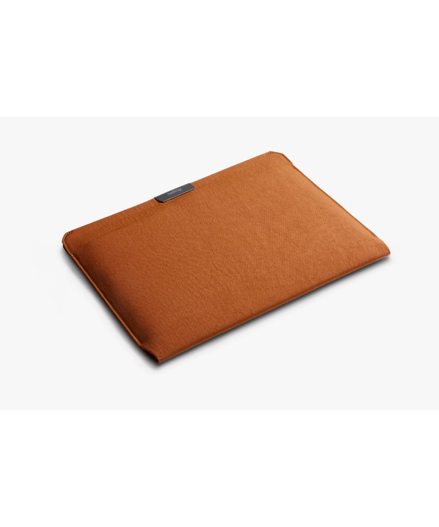 Bellroy 16-inch bronze laptop sleeve with sleek design and padded interior for protection.