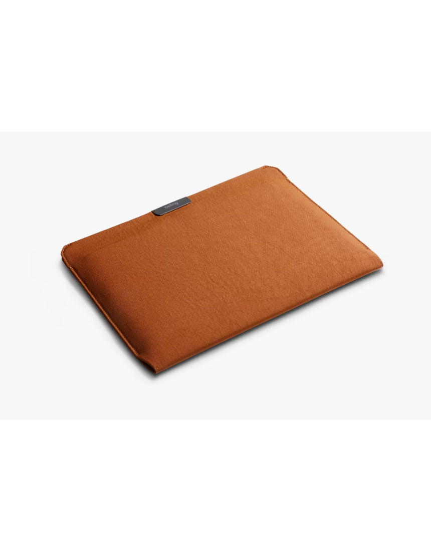 Bellroy 16-inch bronze laptop sleeve with sleek design and padded interior for protection.