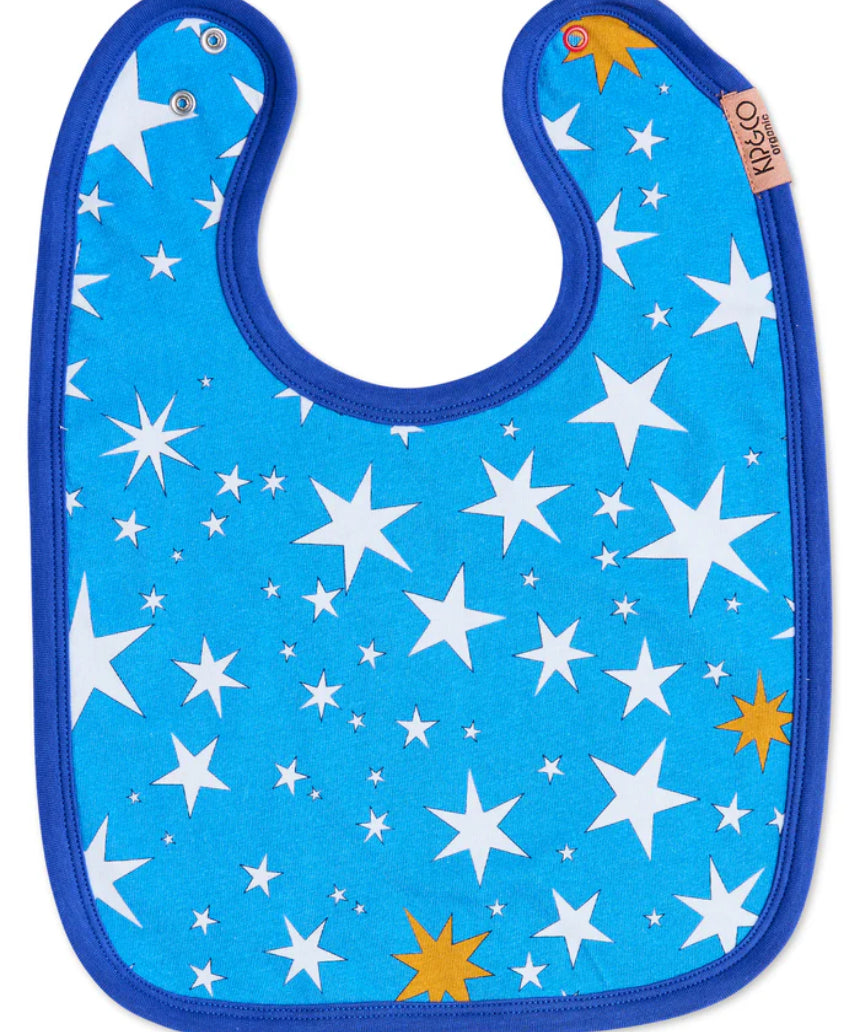 Kip & Co star and moon cotton baby bib with colorful celestial print on soft fabric, designed for infants.