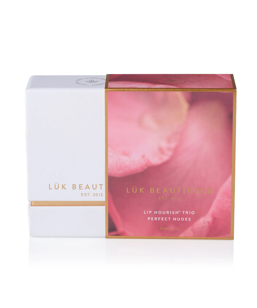 Lük Beautifood Lip Nourish Trio with three nude-colored lip balms in a natural, eco-friendly packaging.