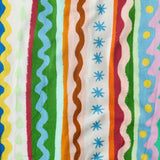 Kip & Co baby clothing beach patterns short sleeve romper with colorful, playful print, ideal for warm weather and casual wear.
