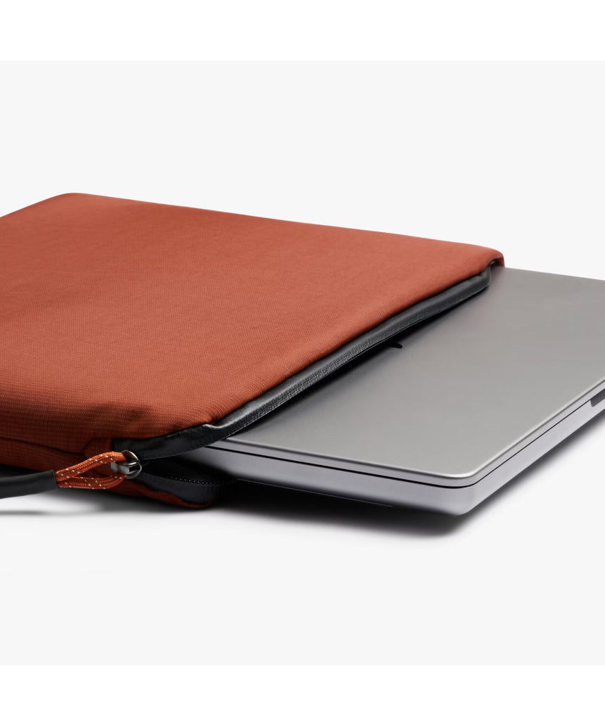 Bellroy Lite Laptop Sleeve 14 inch in clay color, slim protective case with smooth fabric exterior and padded interior for laptops.
