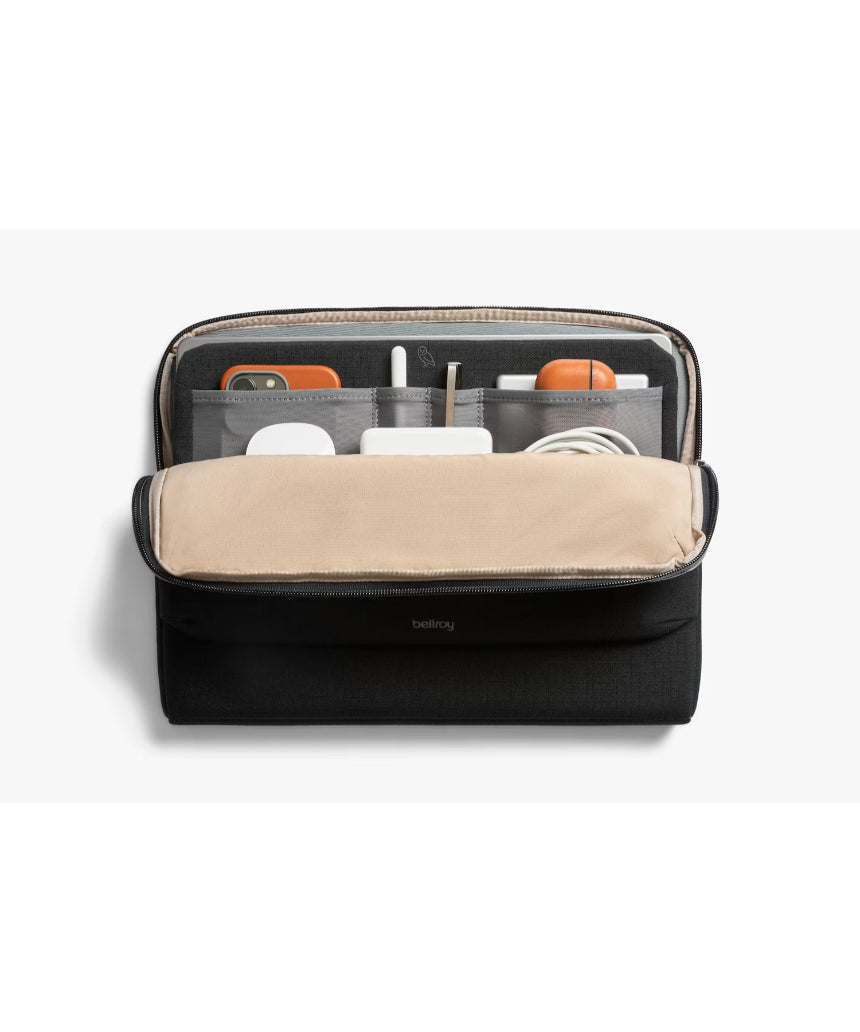 Black Bellroy Laptop Caddy for 14-inch laptops, featuring multiple compartments and sleek design for organized carrying.