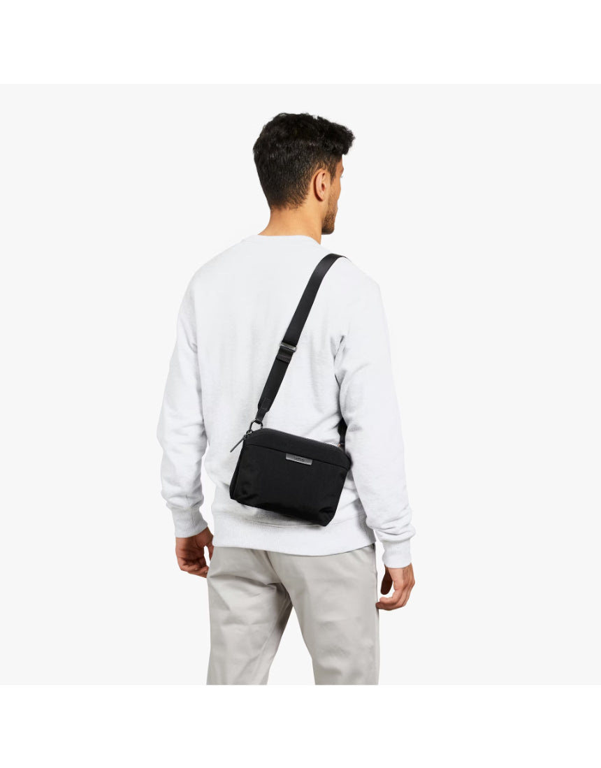 Bellroy Tokyo Side Bag in navy, a stylish crossbody bag with a sleek design and adjustable strap for everyday use.