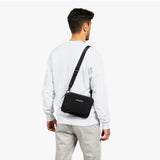 Bellroy Tokyo Side Bag in navy, a stylish crossbody bag with a sleek design and adjustable strap for everyday use.
