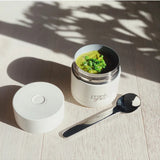Frank Green insulated food container in 295ml size, stainless steel with a sleek design, suitable for hot or cold meals.