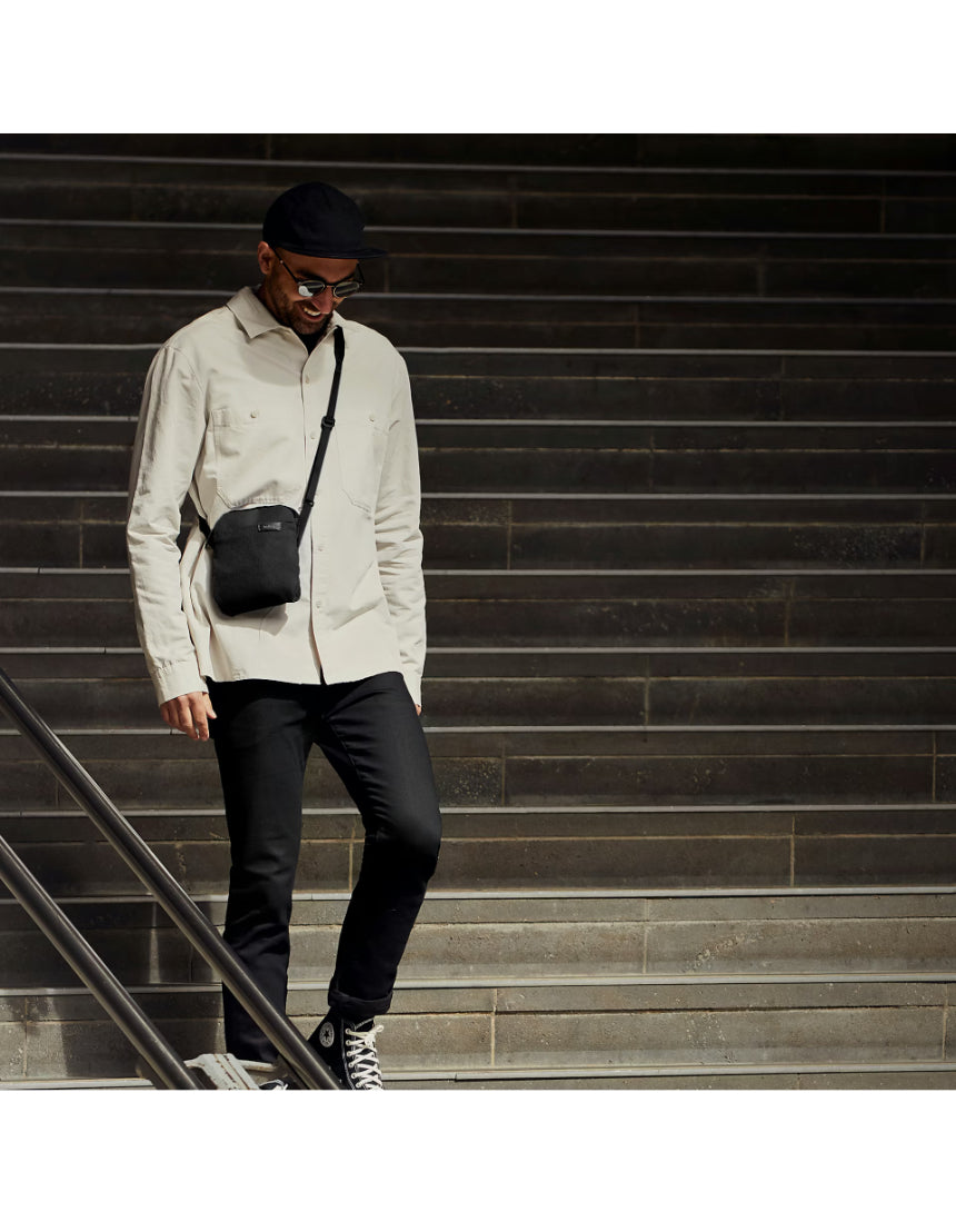 Bellroy City Pouch in Saltbush color, a compact bag with multiple compartments and a sleek design for everyday organization.