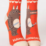 Blue Q Hangry ankle socks featuring vibrant blue fabric with playful, humorous design visible in the image.