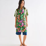 Kip & Co veggie soup apron with colorful vegetable print, ties around the waist, designed for cooking and kitchen protection.