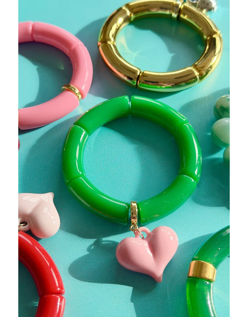 Mosk Melbourne Big Heart Bracelet featuring a large heart charm on a sleek metal chain, stylish jewelry accessory.