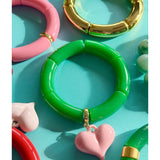 Mosk Melbourne Big Heart Bracelet featuring a large heart charm on a sleek metal chain, stylish jewelry accessory.