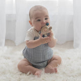 Living Textiles multi-surface teething wheel in steel blue with textured surfaces for soothing teething relief for babies.
