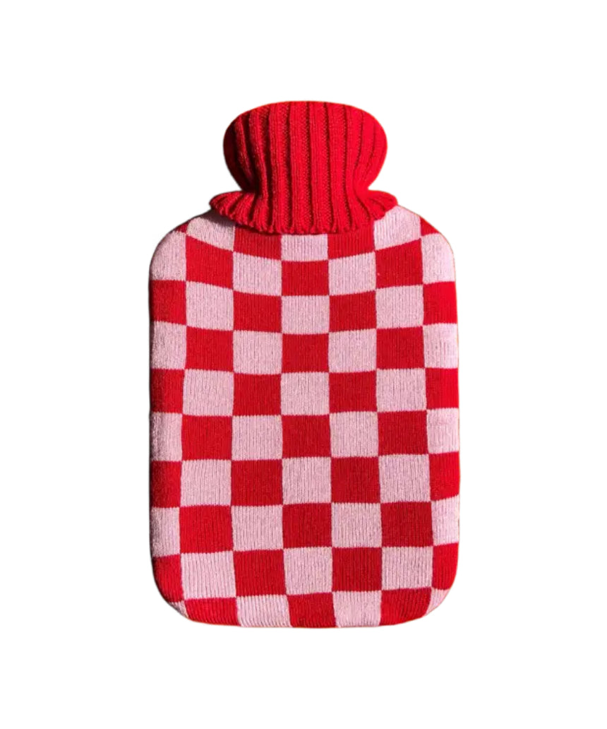 Casa Rolio hot water bottle with blush cover, showing the soft fabric and cozy design for warmth and comfort.